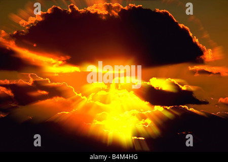 Golden rays through clouds at sunset Ventura California Stock Photo