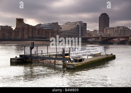 rubbish eating boat on the River Thames Stock Photo