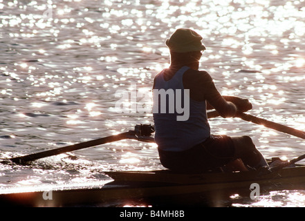 Sculler rowing on the Schuylkill River Stock Photo