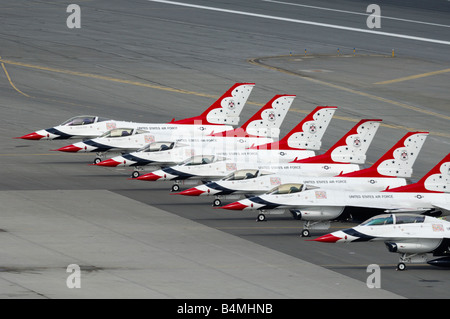 F-16 jet fighters of the aerobatic team Thunderbirds line up on the tarmac of Elmendorf Air Force Base - Alaska Stock Photo