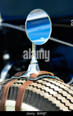 Spare tire-mounted side view mirror on a 1933 Marmon V16 Le Baron Stock Photo