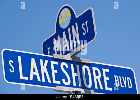 Road sign for intersection of Main Street and Lakeshore Boulevard in downtown Marquette Michigan Stock Photo