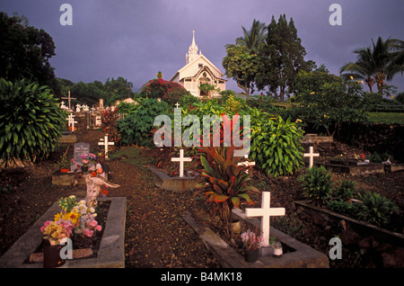 Evening light on the cemetery at St Benedict's Painted Church Kona Coast The Big Island Hawaii Stock Photo