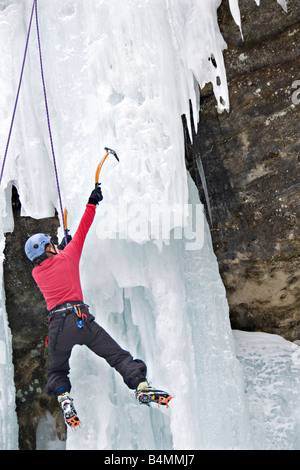Ice climbing during Michigan Ice Fest at Pictured Rocks National Lakeshore in Munising Michigan Upper Peninsula Stock Photo