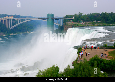 Edge of Niagara falls water American side NY in USA waterfall landscape top view mist nature tourists people US daily life lifestyle living hi-res Stock Photo