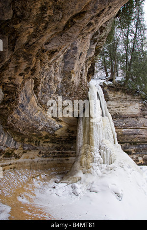 Frozen Munising Falls in Pictured Rocks National Lakeshore in Munising Michigan Upper Peninsula Stock Photo