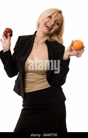 Comparing apples to oranges Stock Photo