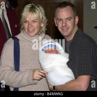 TV presenter and DJ Zoe Ball December 2000 Leaving the Portland hospital with new born baby boy Woody and escorting her was husband Norman Cook Aka Fat Boy Slim Stock Photo