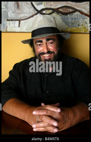 Opera singer Luciano Pavarotti pictured in his home town in Italy with girlfriend Nicoletta Mantovani and their 9 month old daughter Alice Stock Photo