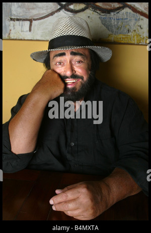 Opera singer Luciano Pavarotti pictured in his home town in Italy with girlfriend Nicoletta Mantovani and their 9 month old daughter Alice Stock Photo