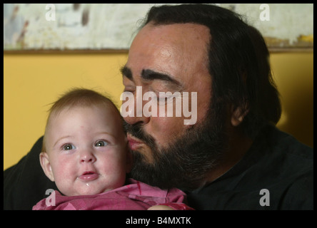 Opera singer Luciano Pavarotti pictured in his home town in Italy with girlfriend Nicoletta Mantovani and their 9 month old daughter Alice Stock Photo