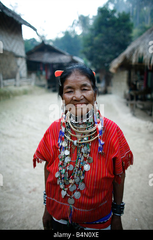 Portrait of an older woman in the Longneck village Approximately 300 Burmese refugees in Thailand are members of the indigenous group known as the Longnecks The largest of the three villages where the Longnecks live is called Nai Soi located near Mae Hong Son City Longnecks wear metal rings on their necks which push the collarbone down and extend the neck They are a tourist attraction Tourists visit Nai Soi to take pictures of the Longnecks and buy their handicrafts The villages are criticized by human rights organizations as human zoos Stock Photo