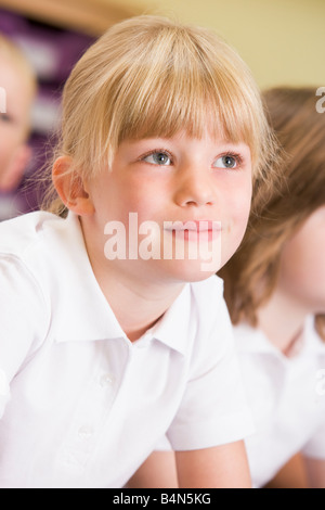 Student in class paying attention (selective focus) Stock Photo