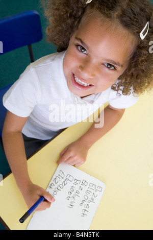 Student in class learning spelling (selective focus) Stock Photo