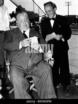 Alfred Hitchcock Film Director with Shorty Joseph Cotten s Valet November 1942 On the film set of Shadow Of Doubt on location in Santa Rosa California Stock Photo