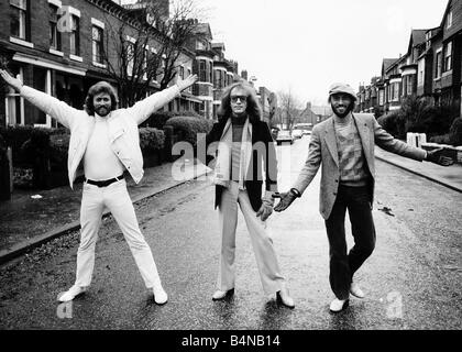 The Bee Gees pop group 1981 Barry Gibb Maurice Gibb Robin Gibb standing in street Stock Photo