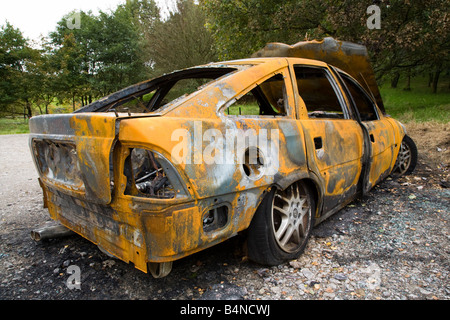 Abandoned burnt out car Stock Photo