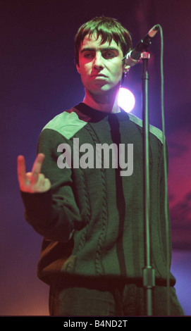 Oasis concert Aberdeen September 1997 Liam Gallagher performing on stage during a concert at the Exhibition and Conference Centre in Aberdeen giving two fingers salute Stock Photo