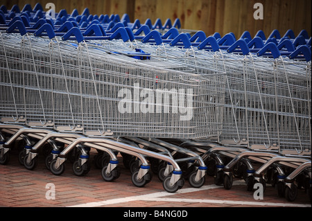 Supermarket trolleys parked at the new Tesco super store in Braunton, North Devon. Stock Photo