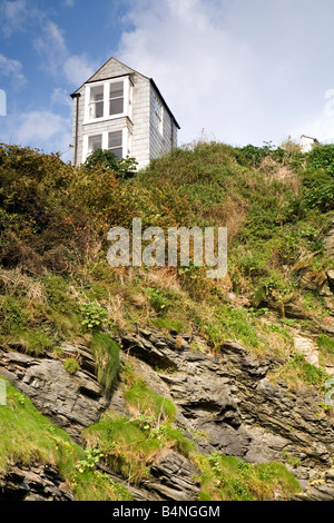 Tiny house perched at the top of a cliff in Port Isaac Cornwall Stock Photo