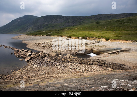 Inlet water supply from Llyn Eigiau into Llyn Cowlyd reservoir part of the nearby Dolgarrog hydro site, Snowdonia, North Wales Stock Photo