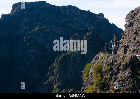 Walker on constructed path below Pico Ruivo Madeira Stock Photo