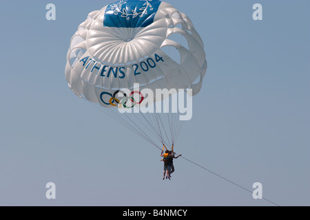 Two people parasailing under a parachute celebrating the Athens Olympics 2004 Stock Photo