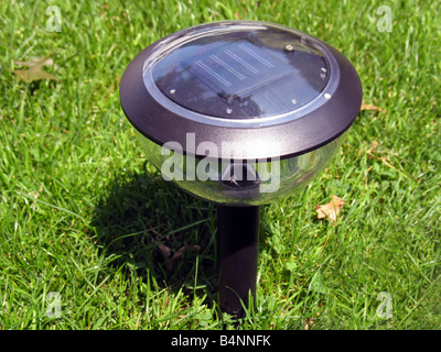 a solar powered garden lamp Stock Photo