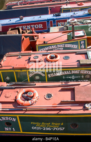 'narrow boats' moored closely together on the canal in 'gas st' birmingham uk Stock Photo