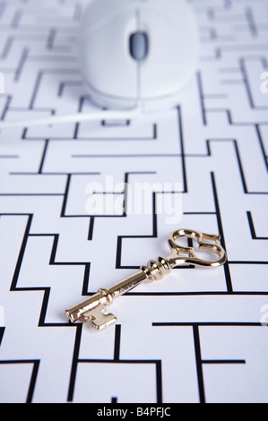 Computer mouse against maze print Stock Photo - Alamy