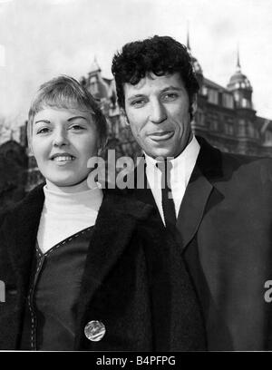 Singer Tom Jones pictured with his wife Linda Melinda who went for a stroll around Hanover Square London looking at the shops Jones had just hit the top of the record charts this week with It s Not Unusual Jones is aged 24 March 1965 Stock Photo
