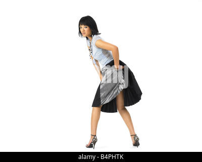 Young sensual woman wearing pleated miniskirt showing her pantie stock  photo (184508) - YouWorkForThem