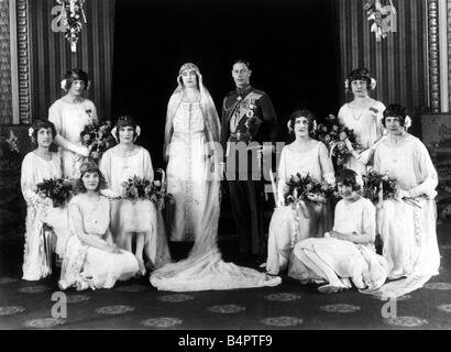 Duke of York Wedding April 1923 Duke of York standing in Buckingham Palace with bride Lady Elizabeth Bowes Lyon together with Bridesmaids after Royal Wedding Stock Photo