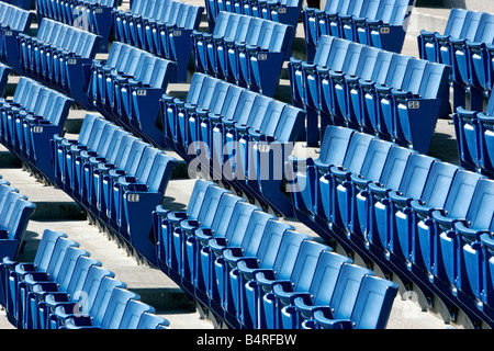 Rows of empty blue seats at a baseball stadium Stock Photo