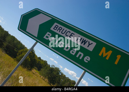 M1 major highway sign pointing to the city of Brisbane on the Bruce Highway in Queensland Stock Photo