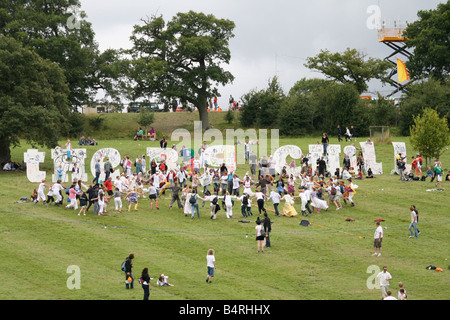 Hippie crowds getting together to bring awareness to Human rights at a music festival Stock Photo