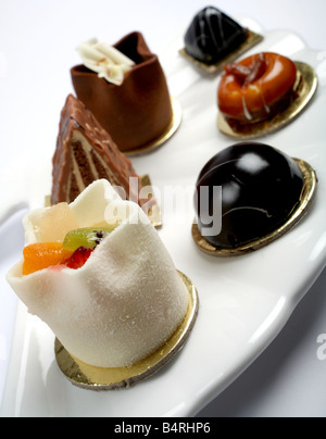 A group of varied gourmet cakes on a plate Stock Photo