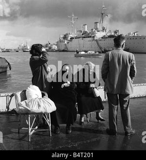 Suez Crisis 1956 British civilians principally Maltese waiting to be evacuated from Port Said on the Asturias They were escorted by Military Police and attended to by Army nurses Stock Photo