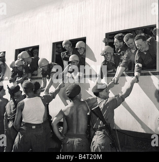 Suez Crisis 1956 A UNO troop train arrives in Port Said and is given a warm welcome by British soldiers Local Caption friendshipimages Stock Photo