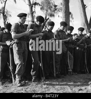 Suez Crisis 1956 British soldiers keep rotesting Egyptians back as ...