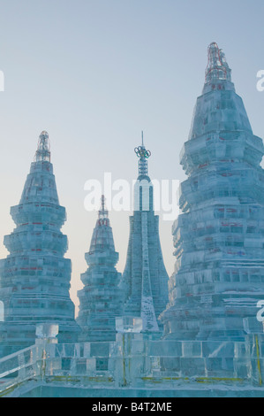 China, Heilongjiang, Harbin, Haerbin Ice and Snow World Festival, Ice Towers at Sunset Stock Photo