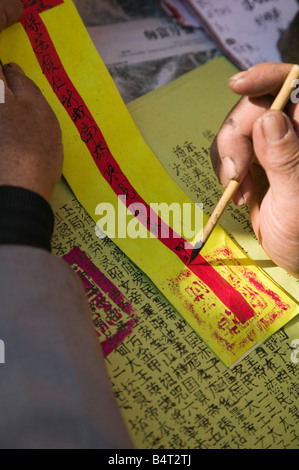 China, Yunnan Province, Erhai Hu Lake Area, Xizhou, Chinese calligrapher Stock Photo