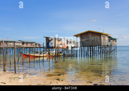 Fishermen s shoreline houses on Mabul Island nr Semporna Sabah Malaysia Stock Photo