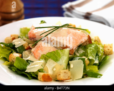 Fresh Healthy Poached Salmon Fillet Or Steak With A Crunchy Caesar Salad And No People Served On A Plate Stock Photo