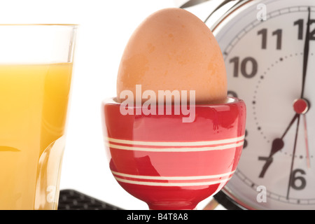 Freshly Cooked Healthy Breakfast Boiled Egg In A Red Egg Cup Isolated Against A White Background With No People And A Clipping Path Stock Photo