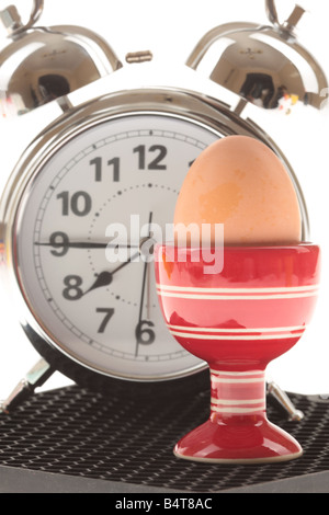 Freshly Cooked Healthy Breakfast Boiled Egg In A Red Egg Cup Isolated Against A White Background With No People And A Clipping Path Stock Photo