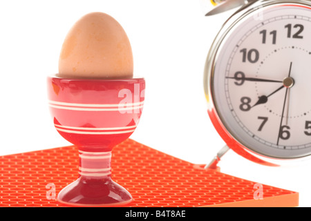 Freshly Cooked Healthy Breakfast Boiled Egg In A Red Egg Cup Isolated Against A White Background With No People And A Clipping Path Stock Photo