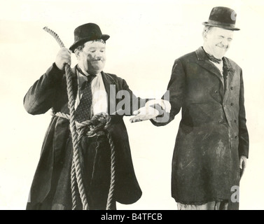 Laurel Hardy Comedy duo Stan Laurel and Oliver Hardy A scene from a film Stock Photo