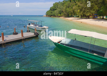 Water taxis at the jetty on Pulau Manukan in Tunku Abdul Rahman National Park nr Kota Kinabalu Sabah Malaysia Stock Photo