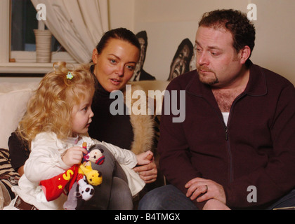 Actor John Thomson ACTOR JOHN THOMSON PICTURED WITH HIS WIFE SAMANTHA AND THEIR 3 YEAR OLD DAUGHTER OLIVIA Stock Photo
